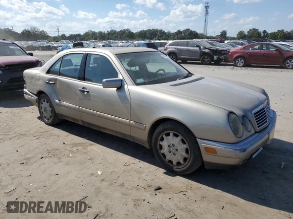 1997 Mercedes-Benz E-Class with VIN WDBJF55F8VJ031008, listed as a Copart auction lot 74305684 with 308,905 mi miles and Clean Title. Bid and sale history available at carsss.com. Image 4.
