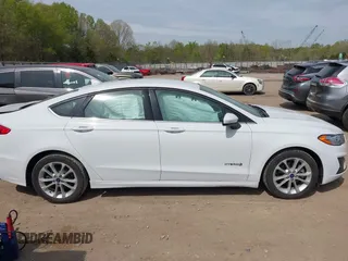 2019 Ford Fusion Hybrid SE with VIN 3FA6P0LU6KR267365, listed as a IAAI auction lot 42030525 with 95,401 mi miles. Bid and sale history available at carsss.com. Image 13.