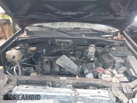 2008 Mercury Mariner with VIN 4M2CU81158KJ14013, listed as a IAAI auction lot 41305863 with 229,672 mi miles and . Bid and sale history available at DreamBid. Image 10.