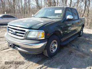 2002 Ford F-150 XLT with VIN 1FTRW07672KB47813, listed as a IAAI auction lot 41788462 with 234,684 mi miles. Bid and sale history available at carsss.com. Image 2.