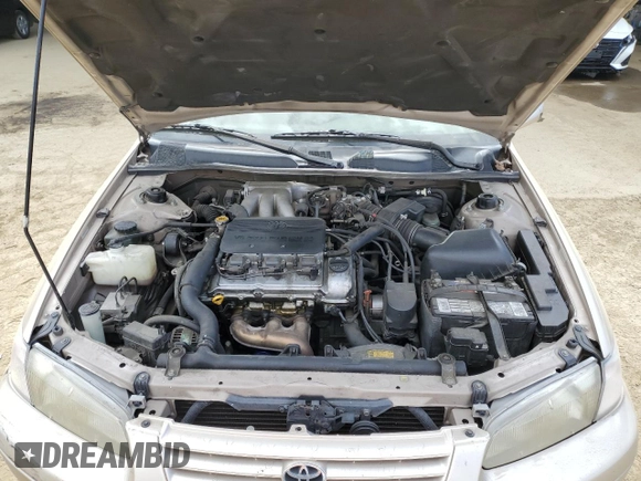 1998 Toyota Camry LE z VIN JT2BF22K8W0133091, wystawiony jako Copart lot #47691625 z przebiegiem 214 743 mil mil oraz Szkoda całkowita • Salvage title. Historia ofert i sprzedaży dostępna na DreamBid. Obrazek 11.