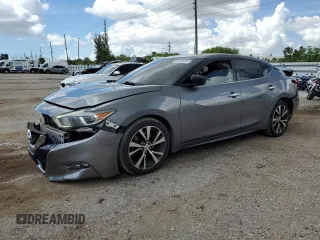 2016 Nissan Maxima SR with VIN 1N4AA6AP6GC446197, listed as a Copart auction lot 66180434 with 92,424 mi miles and Salvage title. Bid and sale history available at DreamBid. Image 1.