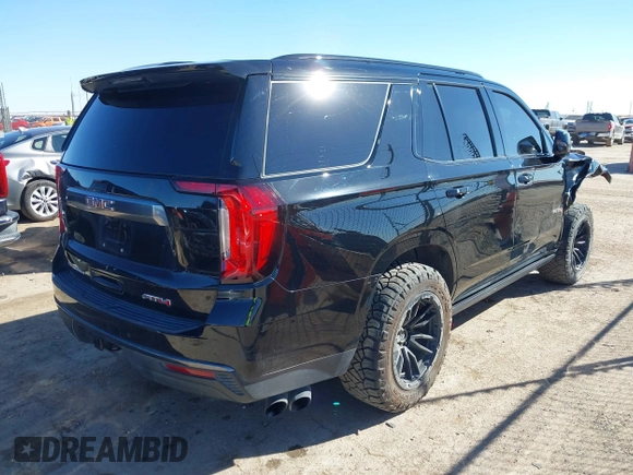 2021 GMC Yukon AT4 with VIN 1GKS2CKD2MR169740, listed as a IAAI auction lot 41472470 with 103,662 mi miles. Bid and sale history available at carsss.com. Image 4.