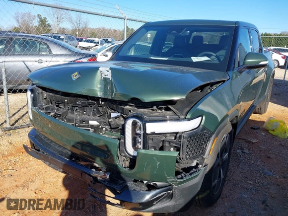 2022 Rivian R1T Adventure Package with VIN 7FCTGAAA2NN006098, listed as a IAAI auction lot 41172815 with 1 mi miles. Bid and sale history available at carsss.com. Image 6.