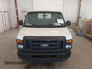 2014 Ford Econoline Cargo Commercial with VIN 1FTNE2EW8EDA09190, listed as a IAAI auction lot 42655816 with 212,534 mi miles and . Bid and sale history available at DreamBid. Image 12.