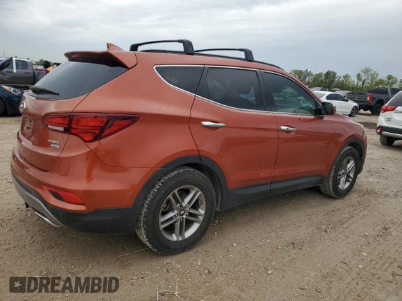 2017 Hyundai Santa Fe 2.4L z VIN 5XYZUDLB6HG411375, wystawiony jako Copart lot #50551165 z przebiegiem 35 597 mil mil oraz Czysty tytuł • Clean title. Historia ofert i sprzedaży dostępna na DreamBid. Obrazek 3.