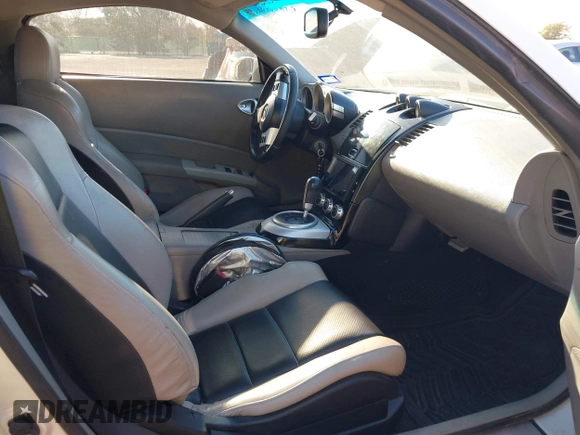 2006 Nissan 350Z Touring z VIN JN1AZ34D96M300181, wystawiony jako IAAI lot #41278695 z przebiegiem 105 033 mil mil oraz . Historia ofert i sprzedaży dostępna na DreamBid. Obrazek 5.