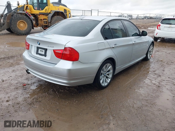 2011 BMW 3 Series 328i with VIN WBAPH7C57BA801980, listed as a IAAI auction lot 42100423 with 130,048 mi miles and . Bid and sale history available at DreamBid. Image 4.