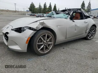 2023 Mazda MX-5 Miata Grand Touring z VIN JM1NDAM7XP0550727, wystawiony jako Copart lot #54882905 z przebiegiem 21 448 mil mil oraz Szkoda całkowita • Salvage title. Historia ofert i sprzedaży dostępna na DreamBid. Obrazek 1.
