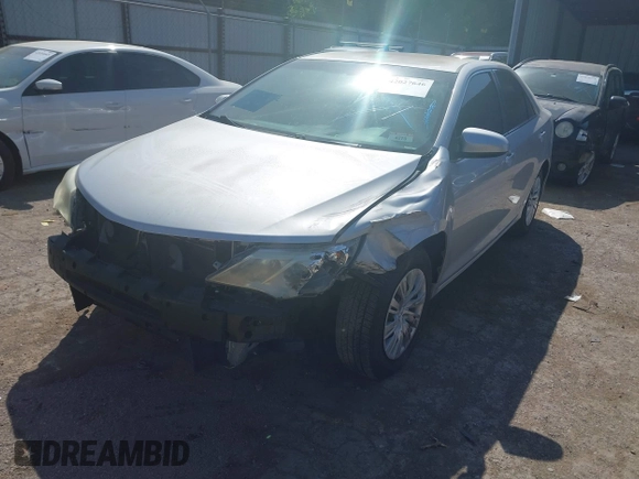 2014 Toyota Camry L with VIN 4T4BF1FK0ER421918, listed as a IAAI auction lot 42027646 with 152,088 mi miles and . Bid and sale history available at DreamBid. Image 2.