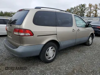 2001 Toyota Sienna LE with VIN 4T3ZF13C11U382702, listed as a Copart auction lot 71856214 with 220,475 mi miles and Clean Title. Bid and sale history available at carsss.com. Image 3.
