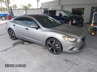 2014 Mazda 6 i Touring with VIN JM1GJ1T6XE1122822, listed as a IAAI auction lot 42713598 with 155,614 mi miles and . Bid and sale history available at DreamBid. Image 1.