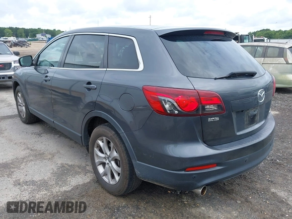 2014 Mazda CX-9 Touring z VIN JM3TB2CAXE0445450, wystawiony jako IAAI lot #42477260 z przebiegiem 139 583 mil mil oraz . Historia ofert i sprzedaży dostępna na DreamBid. Obrazek 3.