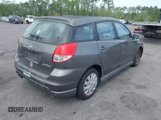 2004 Toyota Matrix Std with VIN 2T1KR32E14C194171, listed as a IAAI auction lot 42059685 with 299,999 mi miles. Bid and sale history available at carsss.com. Image 4.