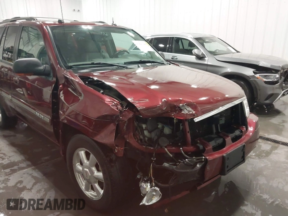 2005 GMC Envoy SLT with VIN 1GKDT13S752214687, listed as a IAAI auction lot 41421248 with 145,388 mi miles. Bid and sale history available at carsss.com. Image 6.