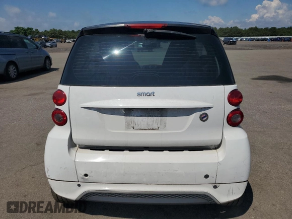 2015 Smart fortwo Passion z VIN WMEEJ3BA4FK816301, wystawiony jako Copart lot #65140935 z przebiegiem 83 465 mil mil oraz Czysty tytuł • Clean title. Historia ofert i sprzedaży dostępna na DreamBid. Obrazek 6.