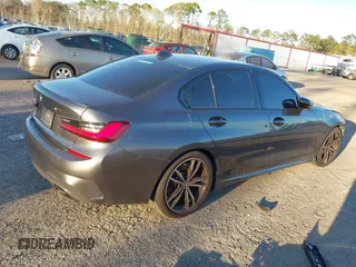 2022 BMW 3 Series M340i with VIN 3MW5U7J01N8C65375, listed as a IAAI auction lot 41688228 with 36,513 mi miles. Bid and sale history available at carsss.com. Image 4.