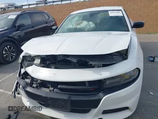 2018 Dodge Charger SXT Plus with VIN 2C3CDXHG4JH187580, listed as a IAAI auction lot 42024602 with 203,843 mi miles and . Bid and sale history available at carsss.com. Image 6.