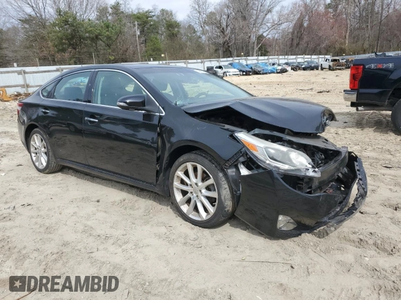 2014 Toyota Avalon Limited with VIN 4T1BK1EB5EU134727, listed as a Copart auction lot 49963195 with 57,083 mi miles and Salvage Title. Bid and sale history available at carsss.com. Image 4.