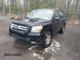2006 Honda Pilot EX-L with VIN 5FNYF18776B021690, listed as a IAAI auction lot 42016219 with 239,666 mi miles and . Bid and sale history available at DreamBid. Image 17.