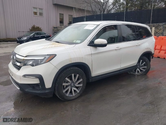 2019 Honda Pilot EX-L with VIN 5FNYF5H56KB013046, listed as a IAAI auction lot 41620961 with 103,886 mi miles. Bid and sale history available at carsss.com. Image 2.