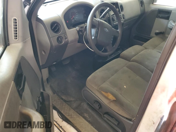 2007 Ford F-150 XL z VIN 1FTRF14WX7KB49430, wystawiony jako Copart lot #59570415 z przebiegiem 249 154 mil mil oraz Czysty tytuł • Clean title. Historia ofert i sprzedaży dostępna na DreamBid. Obrazek 8.
