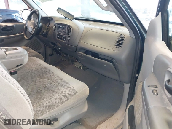 1999 Ford F-150 with VIN 2FTRX17L9XCA19030, listed as a IAAI auction lot 41232157 with Not provided miles and . Bid and sale history available at DreamBid. Image 5.