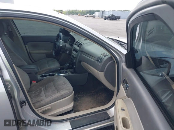 2012 Ford Fusion S with VIN 3FAHP0GAXCR270957, listed as a IAAI auction lot 42122294 with 230,489 mi miles and . Bid and sale history available at carsss.com. Image 5.