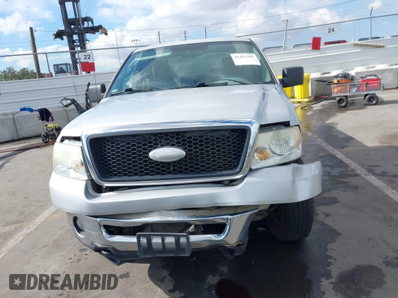 2007 Ford F-150 STX with VIN 1FTRX14W87KC40659, listed as a IAAI auction lot 41423345 with 145,811 mi miles. Bid and sale history available at carsss.com. Image 12.