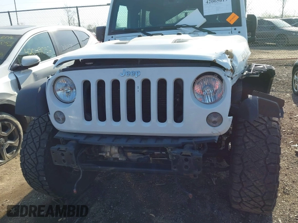 2015 Jeep Wrangler Unlimited Rubicon with VIN 1C4BJWFG1FL602412, listed as a IAAI auction lot 42065619 with 109,070 mi miles. Bid and sale history available at carsss.com. Image 12.