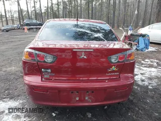 2016 Mitsubishi Lancer SE with VIN JA32V2FW7GU004159, listed as a IAAI auction lot 41401386 with 100,536 mi miles. Bid and sale history available at carsss.com. Image 15.