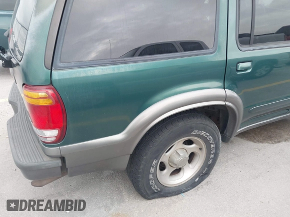 2000 Ford Explorer XLT z VIN 1FMZU63EXYZA22693, wystawiony jako IAAI lot #41350520 z przebiegiem 244 843 mil mil oraz . Historia ofert i sprzedaży dostępna na DreamBid. Obrazek 6.
