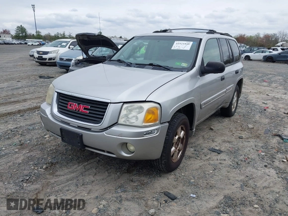 2004 GMC Envoy SLE with VIN 1GKDS13S142202004, listed as a IAAI auction lot 41921818 with 231,912 mi miles and . Bid and sale history available at DreamBid. Image 2.