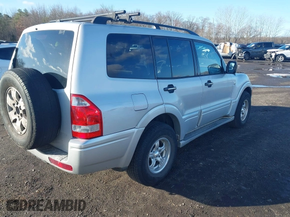 2003 Mitsubishi Montero z VIN JA4NW31S93J037224, wystawiony jako IAAI lot #41848661 z przebiegiem 206 151 mil mil oraz . Historia ofert i sprzedaży dostępna na DreamBid. Obrazek 4.