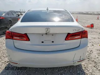 2019 Acura TLX with VIN 19UUB1F30KA003482, listed as a Copart auction lot 57511055 with 64,786 mi miles and Salvage title. Bid and sale history available at DreamBid. Image 6.