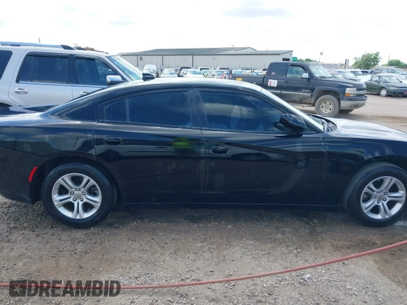 2023 Dodge Charger SXT with VIN 2C3CDXBG2PH550671, listed as a IAAI auction lot 42123200 with 50,818 mi miles. Bid and sale history available at carsss.com. Image 13.