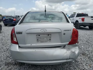 2009 Hyundai Accent Auto GLS z VIN KMHCN46C19U373167, wystawiony jako Copart lot #60026445 z przebiegiem 94 736 mil mil oraz Szkoda całkowita • Salvage title. Historia ofert i sprzedaży dostępna na DreamBid. Obrazek 6.