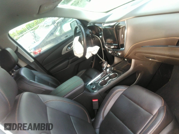 2021 Chevrolet Traverse LT with VIN 1GNERHKW6MJ157311, listed as a IAAI auction lot 42256458 with 97,635 mi miles and . Bid and sale history available at DreamBid. Image 5.