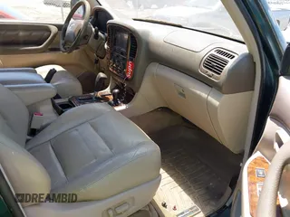 2001 Toyota Land Cruiser z VIN JTEHT05J612006883, wystawiony jako IAAI lot #42351679 z przebiegiem 177 690 mil mil oraz . Historia ofert i sprzedaży dostępna na DreamBid. Obrazek 5.