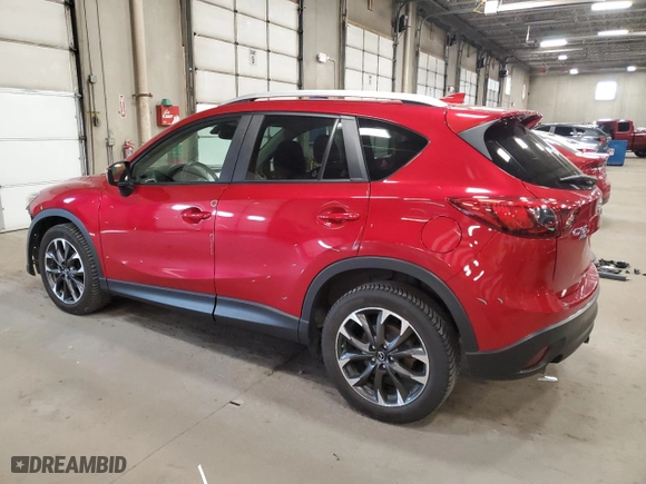 2016 Mazda CX-5 Grand Touring with VIN JM3KE4DY7G0701881, listed as a Copart auction lot 52872925 with 118,559 mi miles and Salvage Title. Bid and sale history available at carsss.com. Image 2.