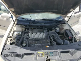 2001 Lincoln Continental z VIN 1LNHM97V91Y622267, wystawiony jako Copart lot #59915445 z przebiegiem 77 070 mil mil oraz Szkoda całkowita • Salvage title. Historia ofert i sprzedaży dostępna na DreamBid. Obrazek 11.