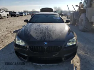 2015 BMW M6 z VIN WBS6C9C5XFD467952, wystawiony jako Copart lot #46312895 z przebiegiem 79 807 mil mil oraz Szkoda całkowita • Salvage title. Historia ofert i sprzedaży dostępna na DreamBid. Obrazek 5.
