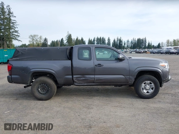 2018 Toyota Tacoma SR z VIN 5TFSX5EN0JX062612, wystawiony jako IAAI lot #41993211 z przebiegiem 92 586 mil mil oraz . Historia ofert i sprzedaży dostępna na DreamBid. Obrazek 13.