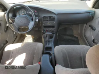 2001 Saturn SL z VIN 1G8ZK547X1Z294553, wystawiony jako Copart lot #53786805 z przebiegiem 288 011 mil mil oraz Szkody całkowita. Historia ofert i sprzedaży dostępna na DreamBid. Obrazek 8.