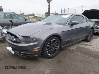 2013 Ford Mustang V6 with VIN 1ZVBP8AM6D5241569, listed as a IAAI auction lot 41884583 with 100,700 mi miles. Bid and sale history available at carsss.com. Image 19.