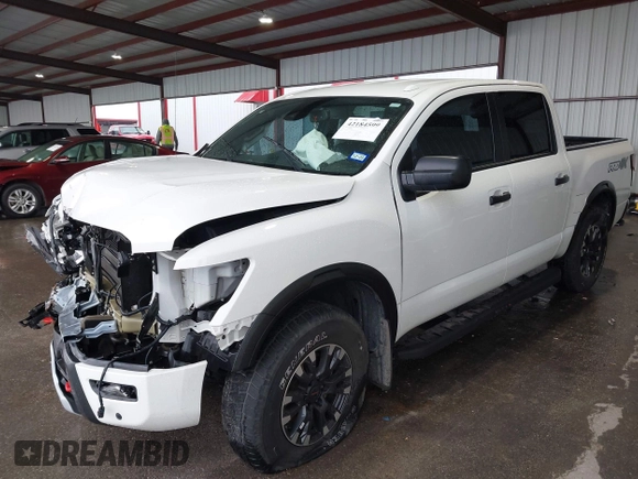2021 Nissan Titan Pro-4X z VIN 1N6AA1ED7MN511004, wystawiony jako IAAI lot #42184599 z przebiegiem 36 086 mil mil oraz . Historia ofert i sprzedaży dostępna na DreamBid. Obrazek 2.