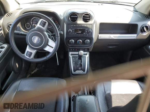 2016 Jeep Compass Latitude with VIN 1C4NJCEA2GD735023, listed as a Copart auction lot 60647035 with 178,952 mi miles and Clean title. Bid and sale history available at DreamBid. Image 8.