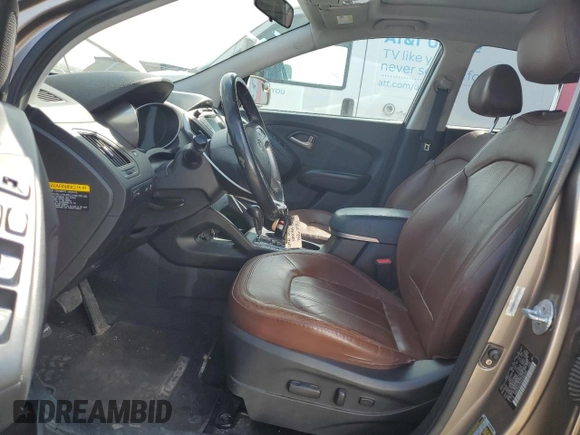 2010 Hyundai Tucson GLS with VIN KM8JU3AC8AU056499, listed as a Copart auction lot 53057365 with 119,906 mi miles and Salvage Title. Bid and sale history available at DreamBid. Image 7.