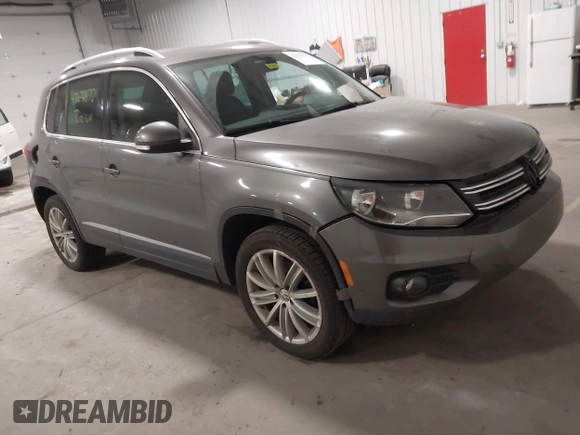 2012 Volkswagen Tiguan S with VIN WVGBV7AX2CW002991, listed as a IAAI auction lot 42031877 with 205,979 mi miles and . Bid and sale history available at DreamBid. Image 1.