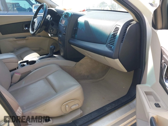 2004 Cadillac CTS with VIN 1G6DM577340132359, listed as a IAAI auction lot 42174306 with 165,844 mi miles. Bid and sale history available at carsss.com. Image 5.